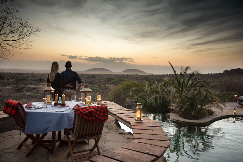 great plains ol donyo lodge sunset dining poolside
